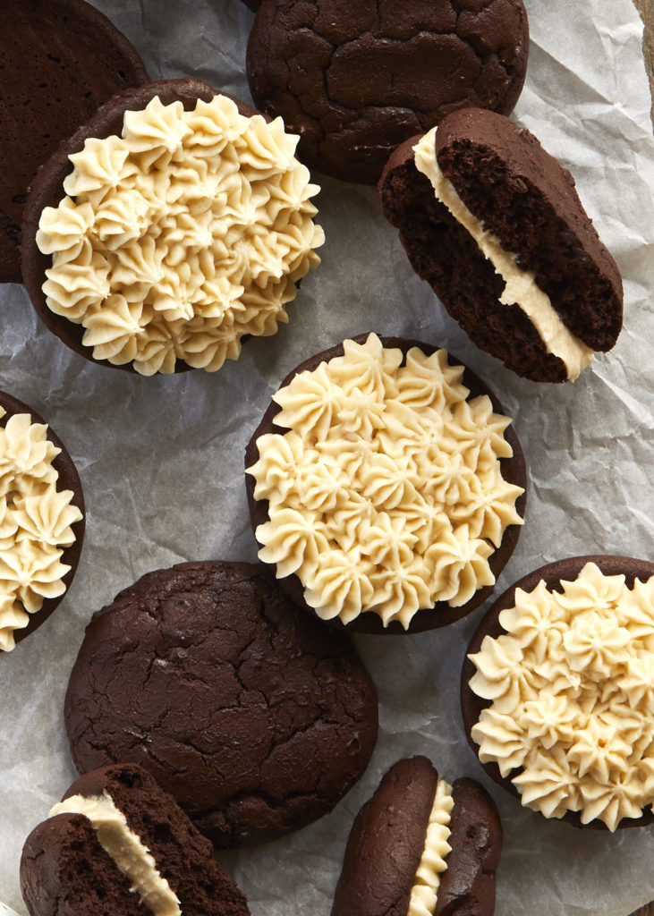 baileys cream filled chocolate whoopie pies served with a chocolate latte and baileys
