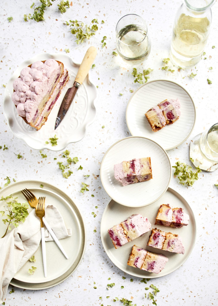 raspberry white chocolate naked cake with raspberry mascarpone whipped cream filling