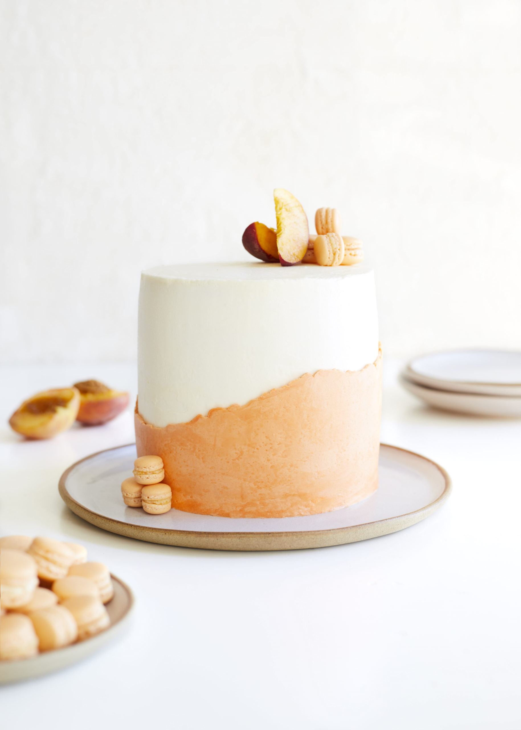 gluten free sour cream brown sugar peach upside down cake with swiss meringue buttercream