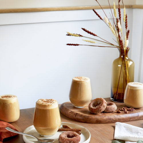 eggnog latte served with a cinnamon donut