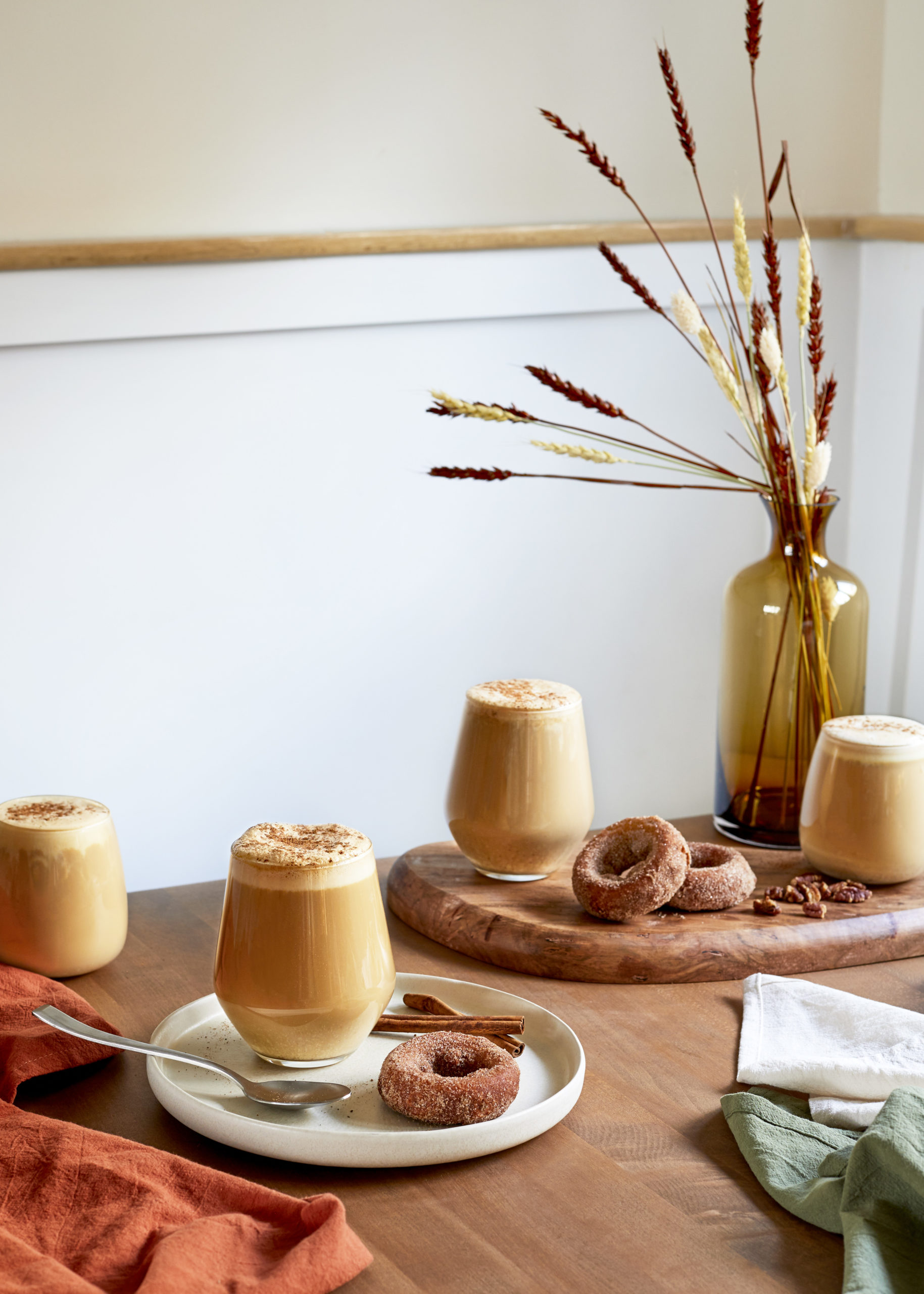 eggnog latte served with a cinnamon donut